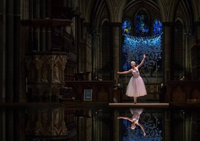 Ballerina Emily Harper dances during the dress rehearsal of A Winter's Trail, a new promenade drama being held at Salisbury Cathedral in Salisbury, England, on Dec. 16. The performance by the Hoodwink Theatre Company, which runs this weekend, is described as a playful journey through the Cathedral after dark, following a trail of winter memories in a magical story told in laughter, lights, singing and dancing, that weaves together childhood and old age. (Matt Cardy/Getty Images)