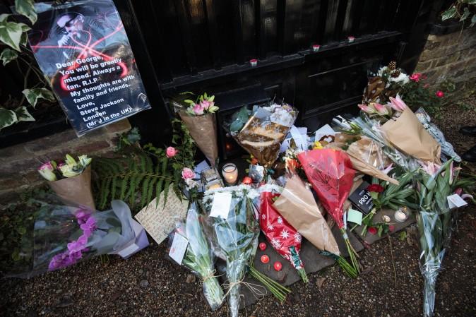 Tributes of flowers are left at the home of pop music icon George Michael in The Grove, Highgate in London, England on Dec. 26, 2016. Singer George Michael died on Christmas day in his country home in Oxfordshire at the age of 53 on Dec. 25. ( Jack Taylor/Getty Images)