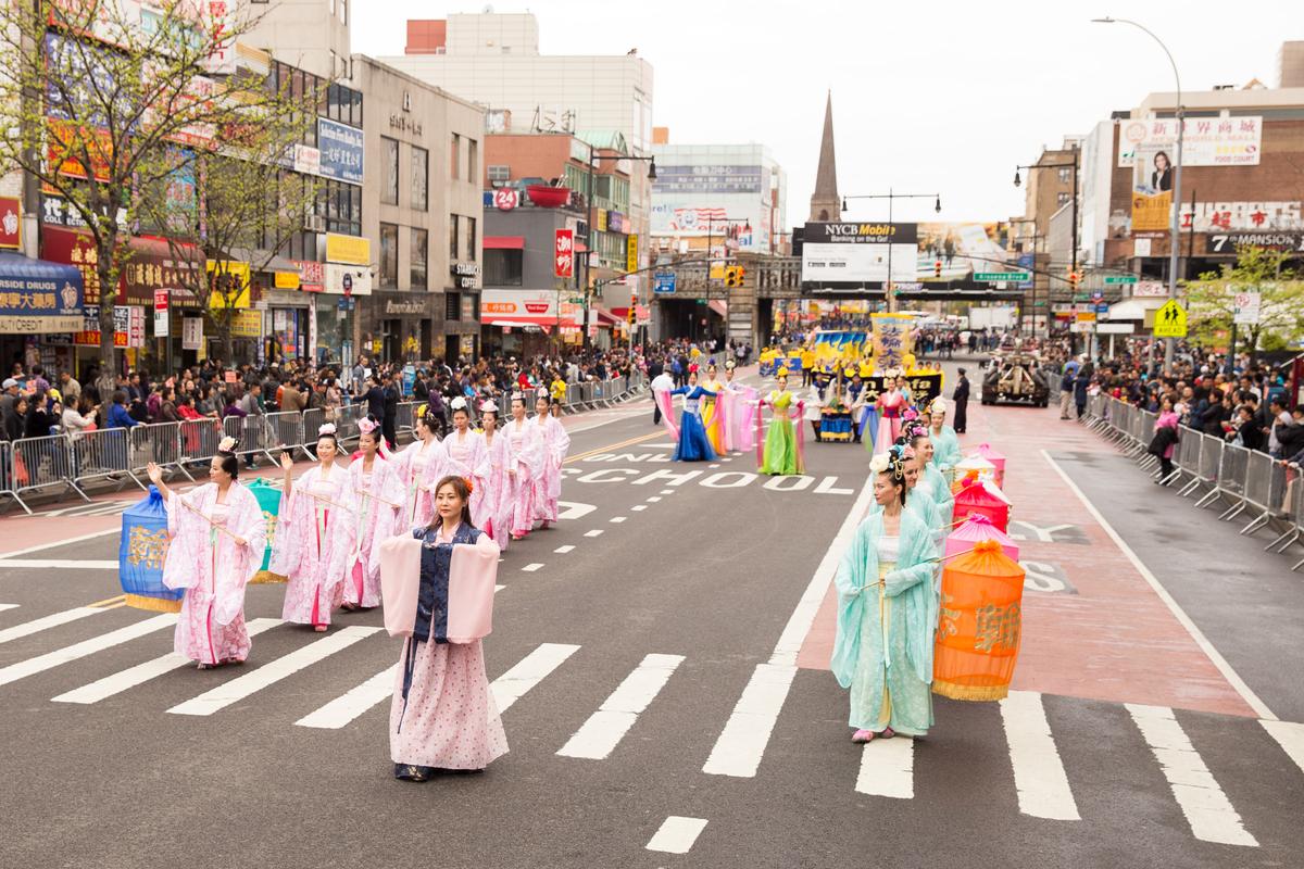 Falun Gong practitioners depict heavenly maidens in the Flushing parade. (Larry Dye/Epoch Times)