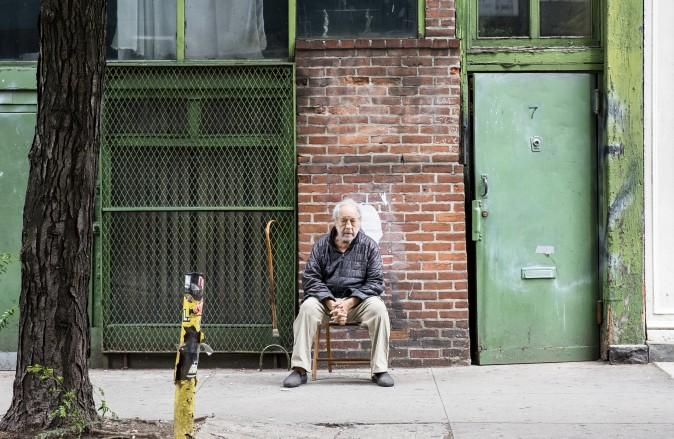 Robert Frank sits outside of his home in New York City on June 8, 2017 (Samira Bouaou/The Epoch Times)