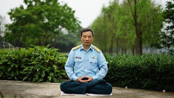 The author doing the sitting meditation of Falun Dafa.