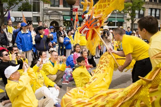 A Falun Gong dragon dance team performs at the World Falun Dafa Day event at Union Square, New York City, on May 11, 2017. (Samira Bouaou/The Epoch Times)