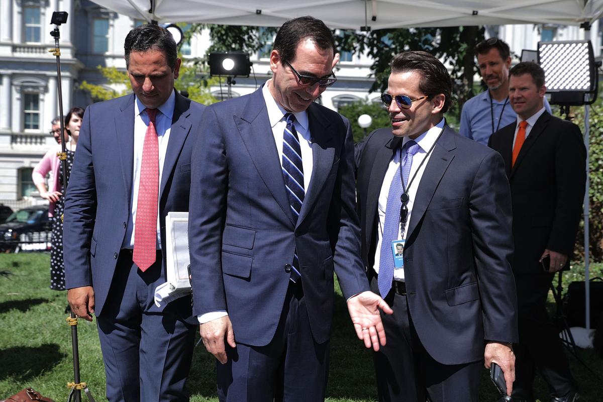 Treasury Secretary Steven Mnuchin (C) talks with incoming White House Communications Diretor Anthony Scaramucci (R) as they are accompanied by Treasury Assistant Secretary of Public Affairs Tony Sayegh during 'Regional Media Day' at the White House in Washington on July 25, 2017. (Photo by Chip Somodevilla/Getty Images)