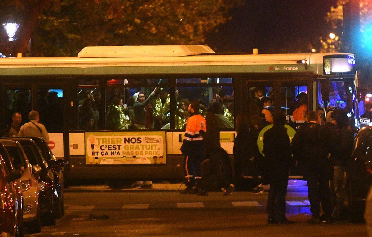 Survivors are seen in a bus after gunfire in the Bataclan concert hall in Paris, France on Nov. 13, 2015. (Antoine Antoniol/Getty Images)