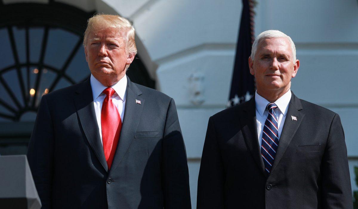 President Donald Trump delivers remarks, as Vice President Mike Pence looks on, about the economy and second quarter GDP growth of 4.1% on the South Lawn of the White House in Washington on July 27, 2018. (Samira Bouaou/The Epoch Times)