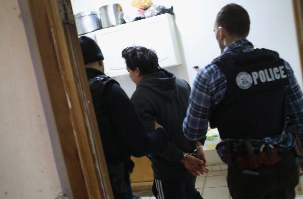 U.S. Immigration and Customs Enforcement (ICE), officers arrest an illegal Mexican immigrant during a raid in the Bushwick neighborhood of Brooklyn in New York City on April 11, 2018. (John Moore/Getty Images)