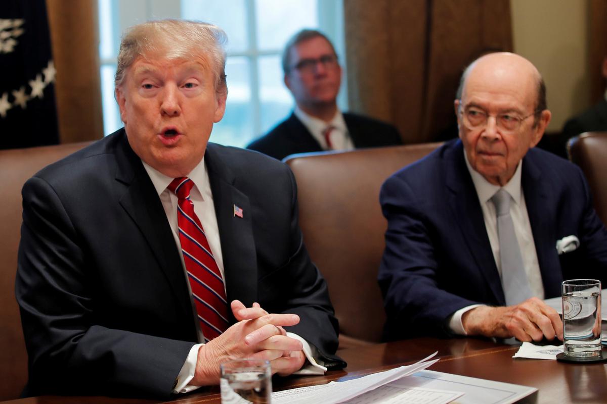 President Donald Trump speaks next to Commerce Secretary Wilbur Ross during a Cabinet meeting at the White House in Washington on Feb. 12, 2019. (Carlos Barria/Reuters)