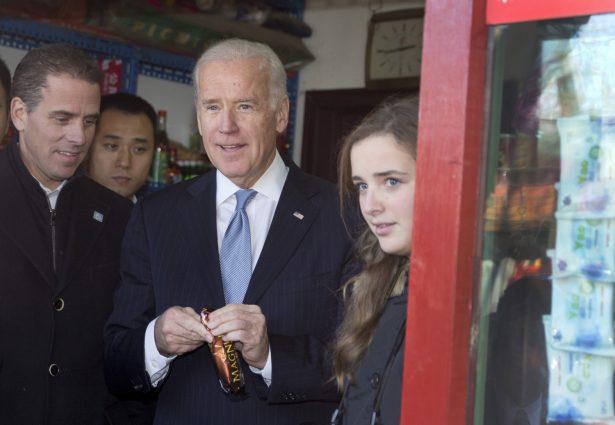 Vice President Joe Biden (C) tours a Hutong alley with his son Hunter Biden (L) and granddaughter Finnegan Biden (R) during an official visit to Beijing, China, on Dec. 5, 2013. (Andy Wong-Pool/Getty Images)