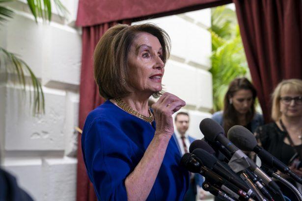 Speaker of the House Nancy Pelosi (D-Calif.) responds to reporters as she departs after meeting with all the House Democrats on May 22, 2019. (J. Scott Applewhite/AP Photo)