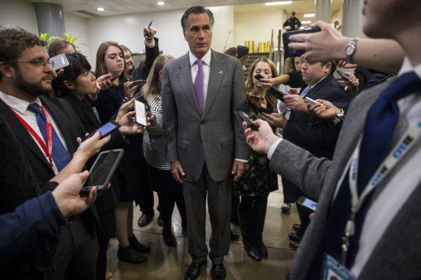 Sen. Mitt Romney speaks to reporters near the Senate Subway on Capitol Hill on Jan. 24, 2019. (Zach Gibson/Getty Images)