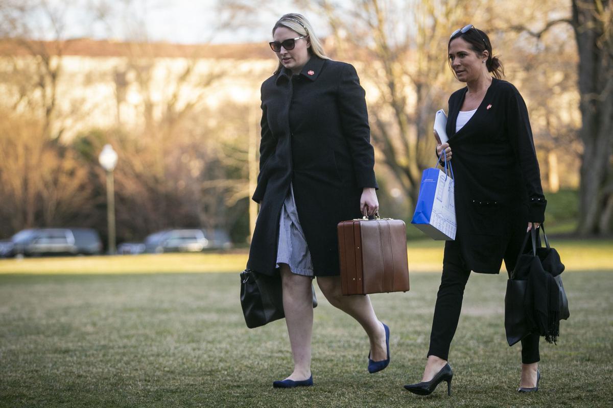Emma Doyle, White House principal deputy chief of staff, and Stephanie Grisham, communications director for First Lady Melania Trump, arrive on the South Lawn of the White House in Washington on March 10, 2019. (Photo by Al Drago/Getty Images)