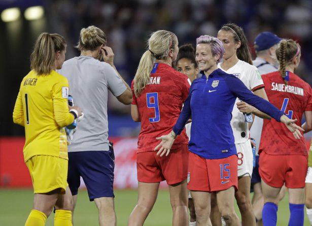 United States' Megan Rapinoe prepares to hug United States goalkeeper Alyssa Naeher after the Women's World Cup semifinal soccer match between England and the United States, at the Stade de Lyon, outside Lyon, France, on July 2, 2019. (Alessandra Tarantino/AP Photo)