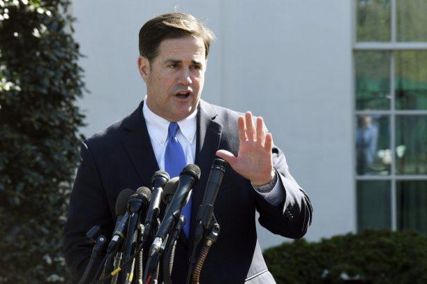 Arizona Gov. Doug Ducey talks to reporters outside the West Wing of the White House in Washington on April 3, 2019. (Susan Walsh/AP Photo)