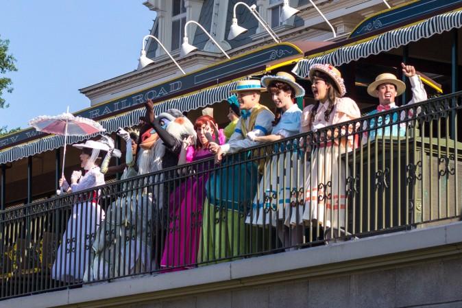 Actors portraying different Disney characters sing to the crowd during the opening ceremony at the Magic Kingdom park in Orlando on May 22, 2016. (Benjamin Chasteen/Epoch Times)