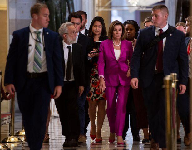 Speaker of the House Nancy Pelosi (D-Calif.) walks with reporters, before the Democrat controlled House of Representatives passed a resolution condemning President Donald Trump for his "racist comments" at the U.S. Capitol in Washington on July 16, 2019. (Andrew Caballero-Reynolds/AFP/Getty Images)