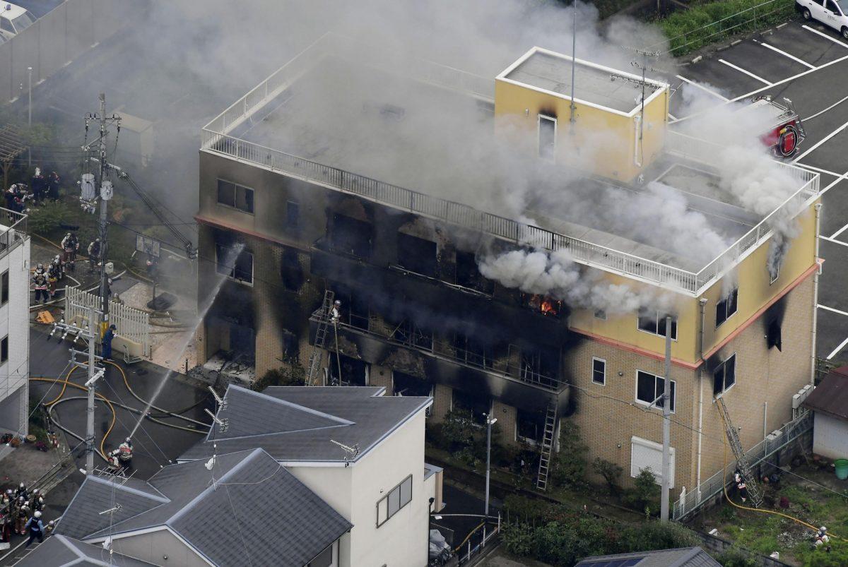 Smoke billows from a three-story building of Kyoto Animation in a fire in Kyoto, western Japan, on July 18, 2019. (Kyodo News via AP)