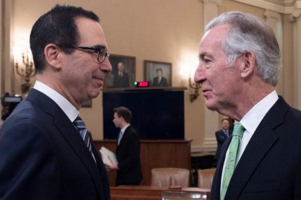 Treasury Secretary Steven Mnuchin (L) speaks with Rep. Richard Neal (D-Mass.), the chairman of the House Ways and Means Committee, prior to testifying on the president’s FY2020 budget proposal on Capitol Hill in Washington on March 14, 2019. (Jim Watson/AFP/Getty Images)