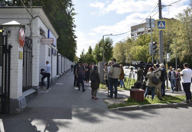 Journalists gather at a hospital where Russian opposition leader Alexei Navalny remained hospitalized, in Moscow, Russia, on July 29, 2019. (AP Photo)