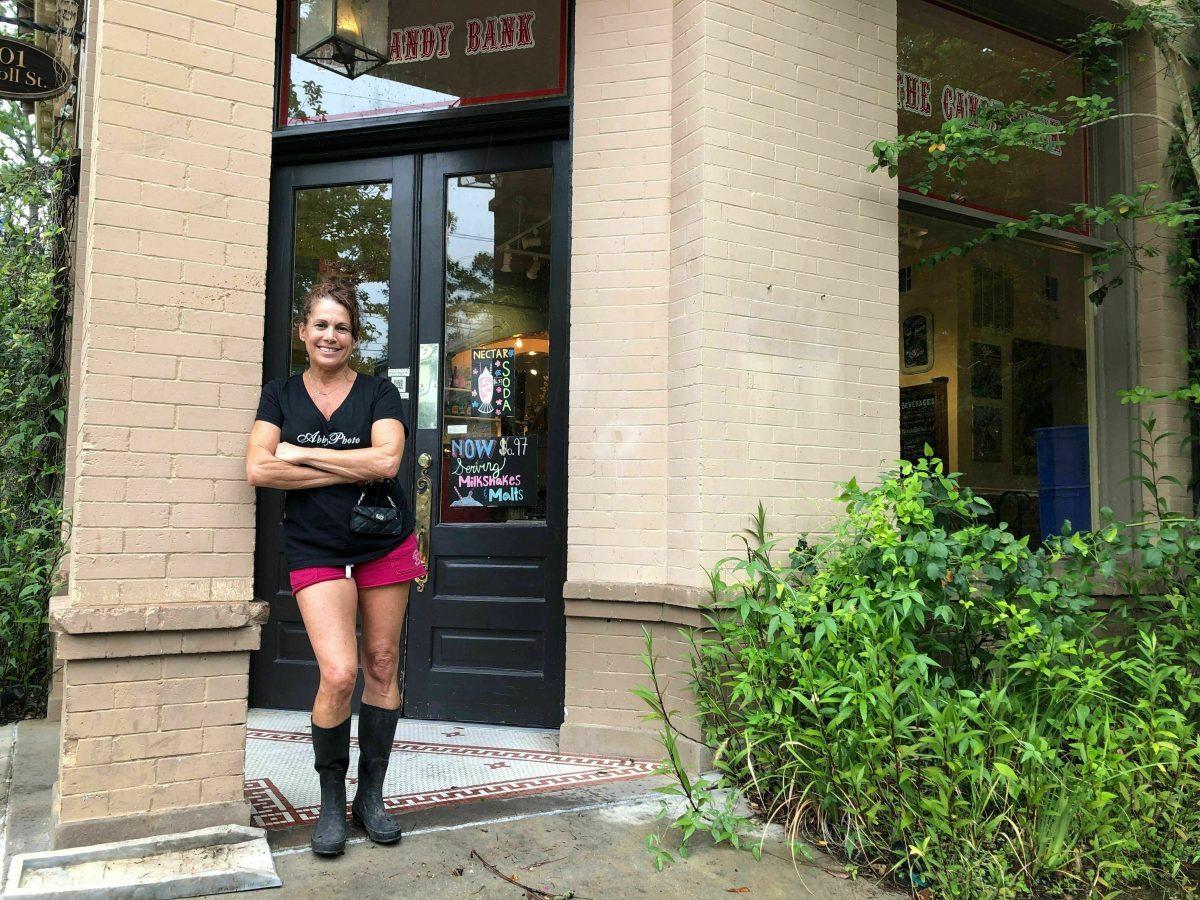 Lisa Keiffer stands in front of her store called The Candy Bank, which is on the north shore of Lake Pontchartrain, in Mandeville, La., on July 13, 2019. (Rebecca Santana/AP Photo)
