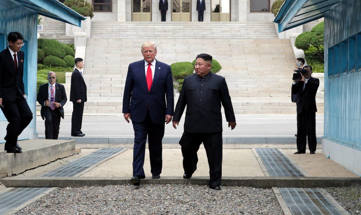 North Korean leader Kim Jong Un and U.S. President Donald Trump inside the demilitarized zone (DMZ) separating the South and North Korea in Panmunjom, South Korea, on June 30, 2019. (Handout/Dong-A Ilbo via Getty Images)