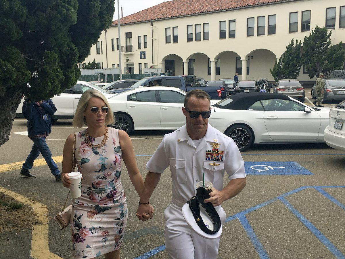 Navy Special Operations Chief Edward Gallagher, right, walks with his wife, Andrea Gallagher as they arrive to military court on Naval Base San Diego, on June 20, 2019. (Julie Watson/AP Photo)