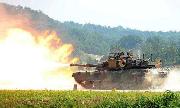 A US M1A2 SEP Abrams battle tank fires live rounds during a joint military exercise between South Korea and the US at the US Army's Rodriguez Live Firing Range in Pocheon, South Korea, on Sept. 1, 2011. (Park Ji-Hwan/AFP/Getty Images)
