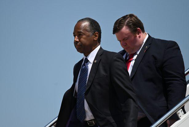 Secretary of Housing and Urban Development Ben Carson (L), arrives at Joint Base Andrews in Maryland with President Donald Trump, not pictured, on July 3, 2019. Carson went on a tour of Baltimore's HUD facility on July 31, 2019. (Andrew Caballero-Reynolds/AFP/Getty Images)