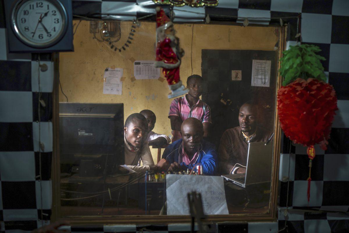 Congolese journalists broadcast an Ebola awareness program from a local radio station in Beni, Congo DRC on July 13, 2019. (AP Photo/Jerome Delay)
