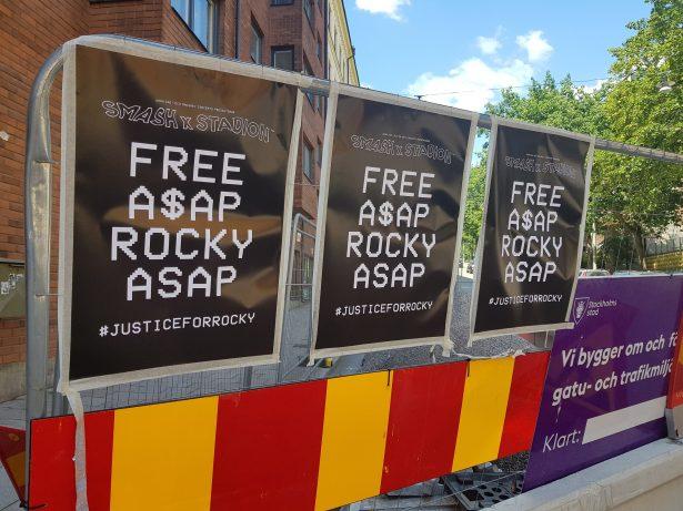 Posters asking for ASAP Rocky to be freed line the wall across from the jail where the American rapper is being held over charges of assault in Stockholm, Sweden on July 25, 2019. (Philip O'Connor/Reuters)