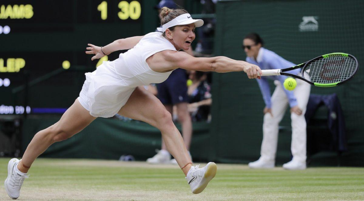 Romania's Simona Halep returns the ball to United States' Serena Williams during the women's singles final match on day twelve of the Wimbledon Tennis Championships in London, on July 13, 2019. (Ben Curtis/AP Photo)