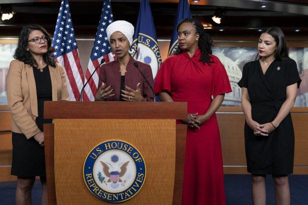 From left, Reps. Rashida Tlaib, (D-Mich.), Ilhan Omar, (D-Minn.), Ayanna Pressley, (D-Mass.), and Alexandria Ocasio-Cortez, (D-NY), respond to remarks by President Donald Trump during a news conference at the Capitol in Washington on July 15, 2019. (J. Scott Applewhite/AP Photo)