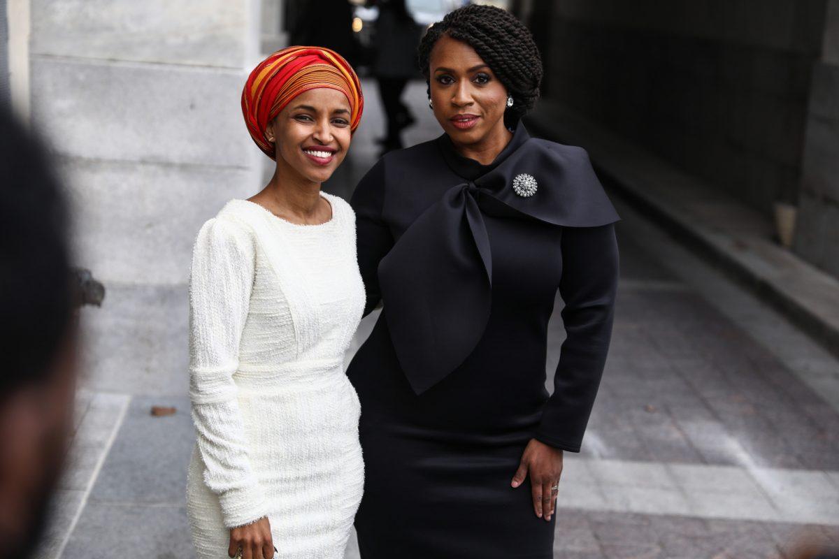 Rep. Ilhan Omar (D-Minn), left, poses with Rep. Ayanna Pressley (D-Mass.) in Washington on Jan. 3, 2019. (Samira Bouaou/The Epoch Times)