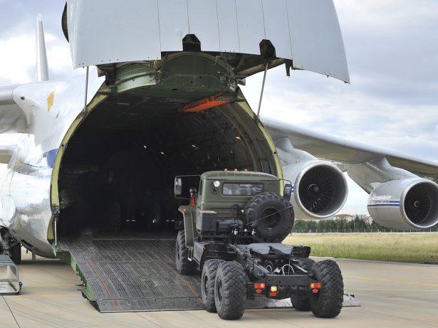 Military vehicles and equipment, parts of the S-400 air defense systems, are unloaded from a Russian transport aircraft, at Murted military airport in Ankara, Turkey, on July 12, 2019. (Turkish Defence Ministry via AP, Pool)