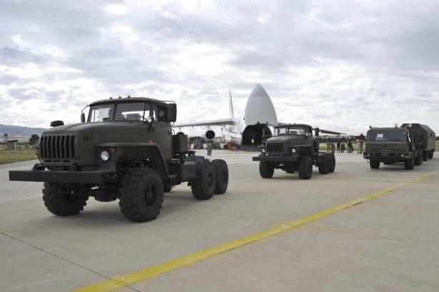 Military vehicles and equipment, parts of the S-400 air defense systems, are seen on the tarmac, after they were unloaded from a Russian transport aircraft, at Murted military airport in Ankara, Turkey, on July 12, 2019. (Turkish Defence Ministry via AP, Pool)