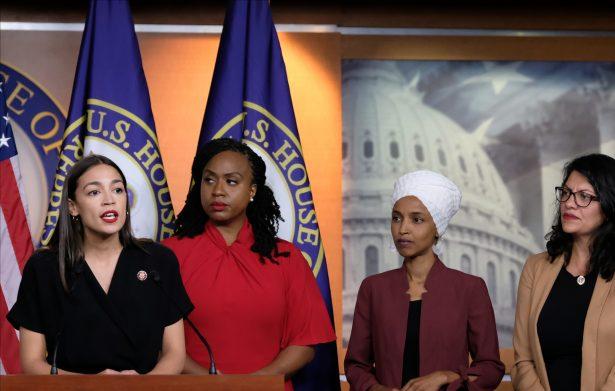 Reps. Alexandria Ocasio-Cortez (D-N.Y.) speaks as Reps. Ayanna Pressley (D-Mass.), Ilhan Omar (D-Minn.), and Rashida Tlaib (D-Mich.) listen at a press conference at the U.S. Capitol in Washington on July 15, 2019. (Alex Wroblewski/Getty Images)