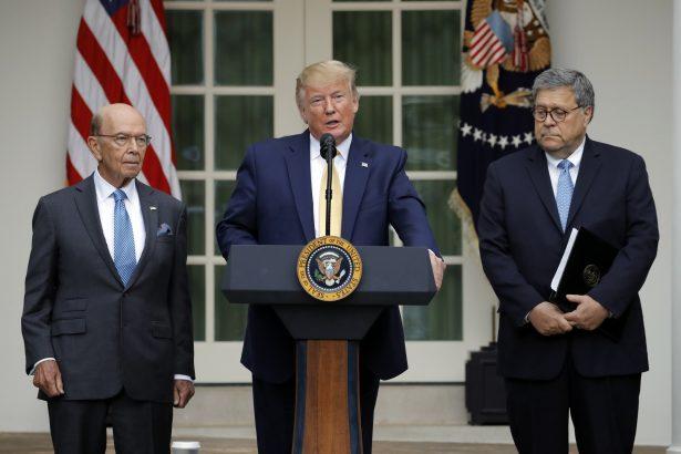 President Donald Trump is joined by Commerce Secretary Wilbur Ross and Attorney General William Barr, (R), as he speaks in the Rose Garden at the White House on July 11, 2019. (AP Photo/Carolyn Kaster)