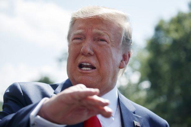 President Donald Trump talks to reporters on the South Lawn of the White House before departing for his Bedminster, N.J. golf club in Washington on July 5, 2019. (Evan Vucci/AP Photo)