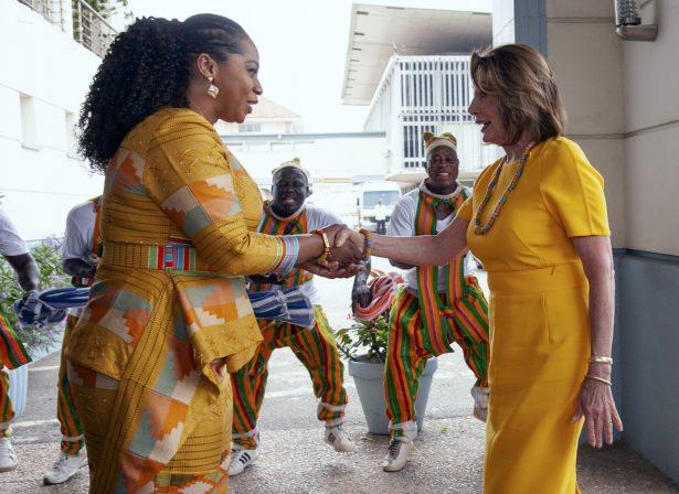 House Speaker Nancy Pelosi (D-Calif.) shakes hands with Hon. Sarah Adwoa Sarfo outside Ghana's Parliament in Accra, Ghana on July 31, 2019. (AP Photo/Christian Thompson)