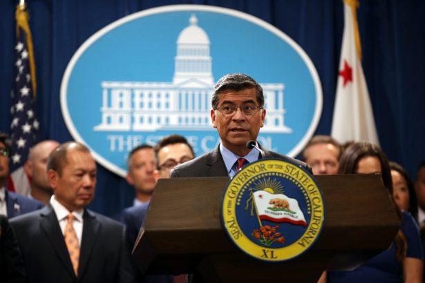 California attorney General Xavier Becerra (C) speaks during a news conference with California Gov. Gavin Newsom at the California State Capitol in Sacramento, Calif., on Aug. 16, 2019.  (Justin Sullivan/Getty Images)