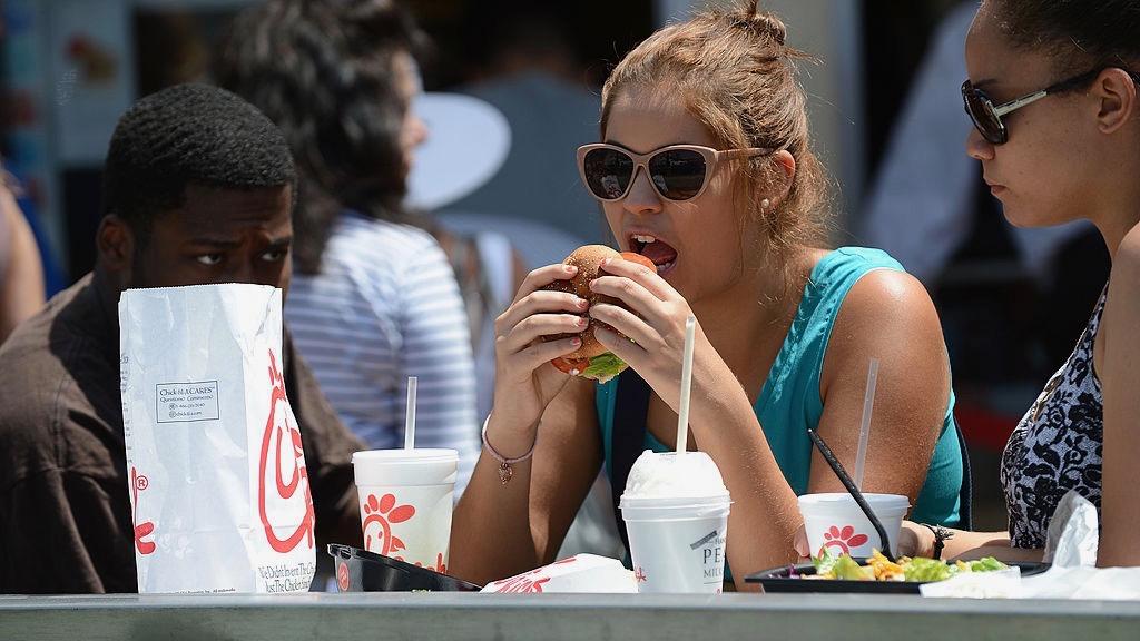 A woman eats lunch on the patio of the Chick-fil-A in Hollywood, Calif., on Aug. 1, 2012. (Robyn Beck/AFP/GettyImages)