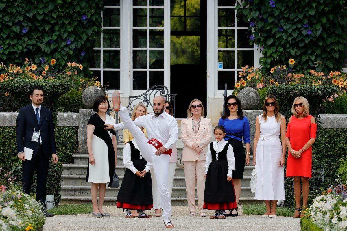 (From L) Japan's Prime Minister's wife Akie Abe, European Council President's wife Malgorzata Tusk, Australia's Prime Minister's wife Jenny Morrison, Chile's First Lady Cecilia Morel, President of the World Bank Group's wife Adele Malpass, First Lady Melania Trump and wife of French President Brigitte Macron look at traditional dance performance as they arrive at the Villa Arnaga in Cambo-les-Bains during a visit on traditional Basque culture, near Biarritz as part of the G7 summit, on Aug. 25, 2019. (Thomas Samson/AFP/Getty Images)