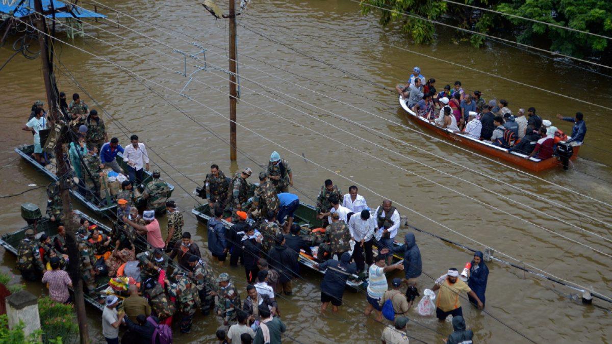 Army and Navy personnel evacuate flood-affected people to safer places in Sangli district in the western state of Maharashtra, India on Aug. 10, 2019. (Stringer/Reuters)