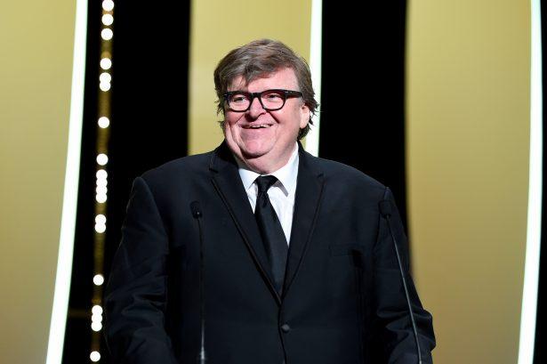 Michael Moore presents the Jury Prize at the Closing Ceremony during the 72nd annual Cannes Film Festival in Cannes, France, on May 25, 2019. (Pascal Le Segretain/Getty Images)