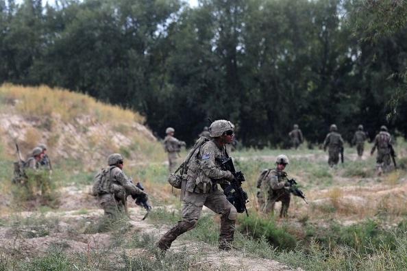 U.S. soldiers from 3rd Platoon, Bulldog Troop, 1st Squadron (Airborne), 91st U.S. Cavalry Regiment, 173rd Airborne Brigade Combat Team, based at Combat Outpost McClain operating under the NATO sponsored International Security Assistance Force (ISAF) patrol in the area of Ahmadzi village in Muhammad Agah, Logar Province, Afghanistan, on Oct. 6, 2012. (Munir Uz Zaman/AFP/GettyImages)