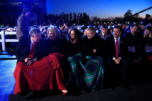 (L) Rep. Mark Meadows (R-N.C.), Rep. Jim Jordan (R-Ohio), second from right, and Rep. Devin Nunes (R-Calif.), right, wait for President Donald Trump and First Lady Melania Trump to attend the National Christmas Tree lighting ceremony at the Ellipse near the White House, on Dec. 5, 2019. (Manuel Balce Ceneta/AP)