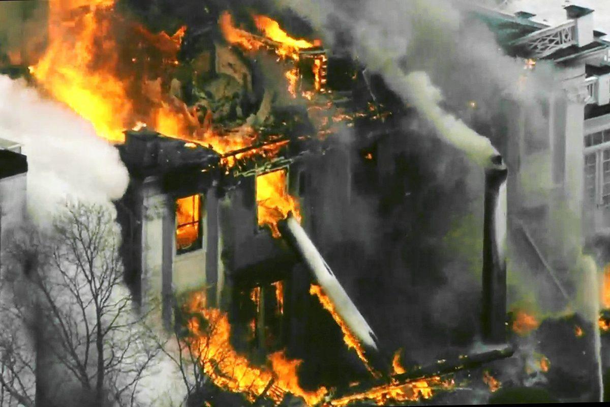 A mansion ablaze in Concord, Mass., on Dec. 27, 2019. (WCVB-TV via AP)
