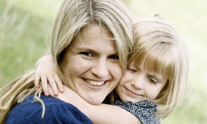 Jenny Phillips with one of her children. (Courtesy of <a href="https://www.goodandbeautiful.com/">Jenny Phillips</a>)