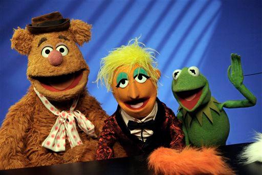 In this Nov. 24, 2008 file photo, Muppets Fozzie Bear, left, a Whatnot, center, and Kermit the Frog make a television appearance in New York. (AP Photo/Richard Drew)