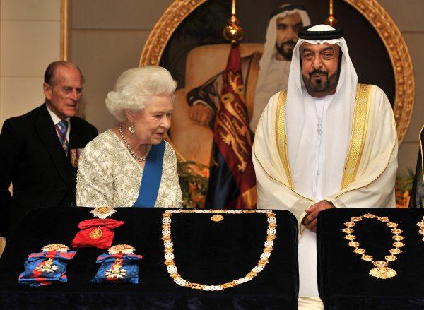 The most expensive yacht in the world is owned by United Arab Emirates President Sheikh Khalifa Bin Zayed al Nahyan, also known as Sheikh Khalifa. Here he exchanges gifts with Queen Elizabeth II in November 2010. (John Stillwell - Pool/Getty Images)