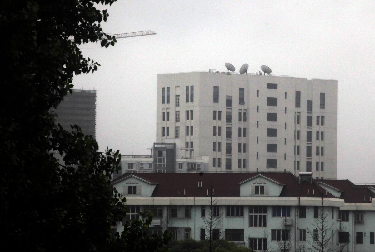 The building housing China’s hacker military division, Unit 61398, of the People’s Liberation Army, in the outskirts of Shanghai, May 31, 2013. Businesses and government agencies in the United States are regularly targeted by cyberattacks from China. (AP Photo)